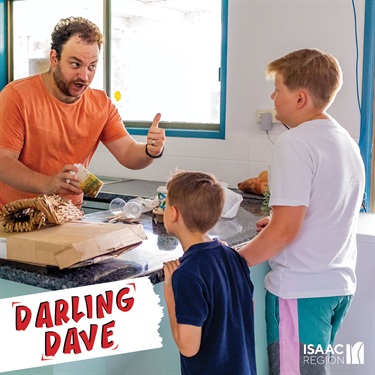 Darling Dave holdi9ng some recycling and showing kids what to do with it